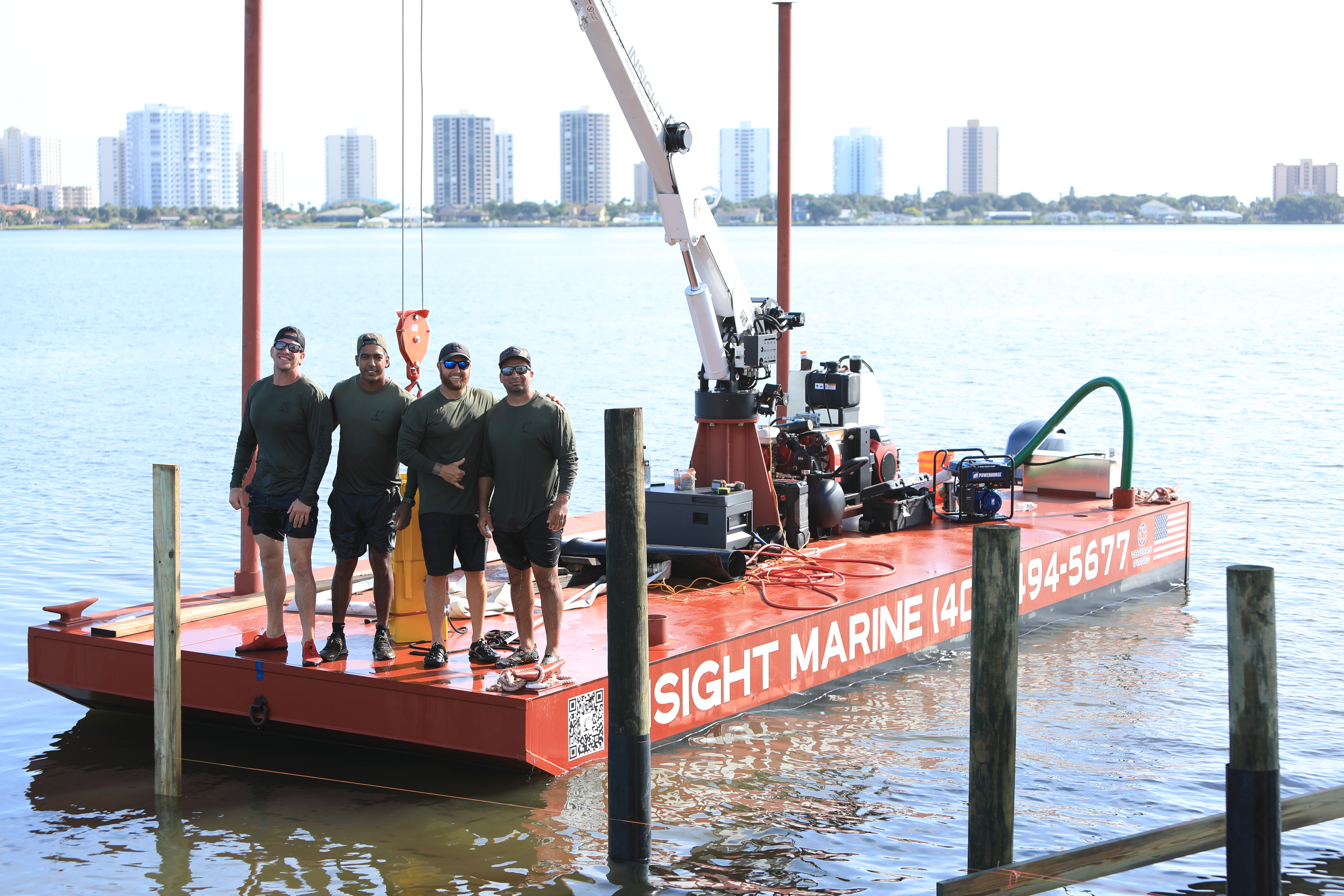 Insight Marine crew standing on the barge