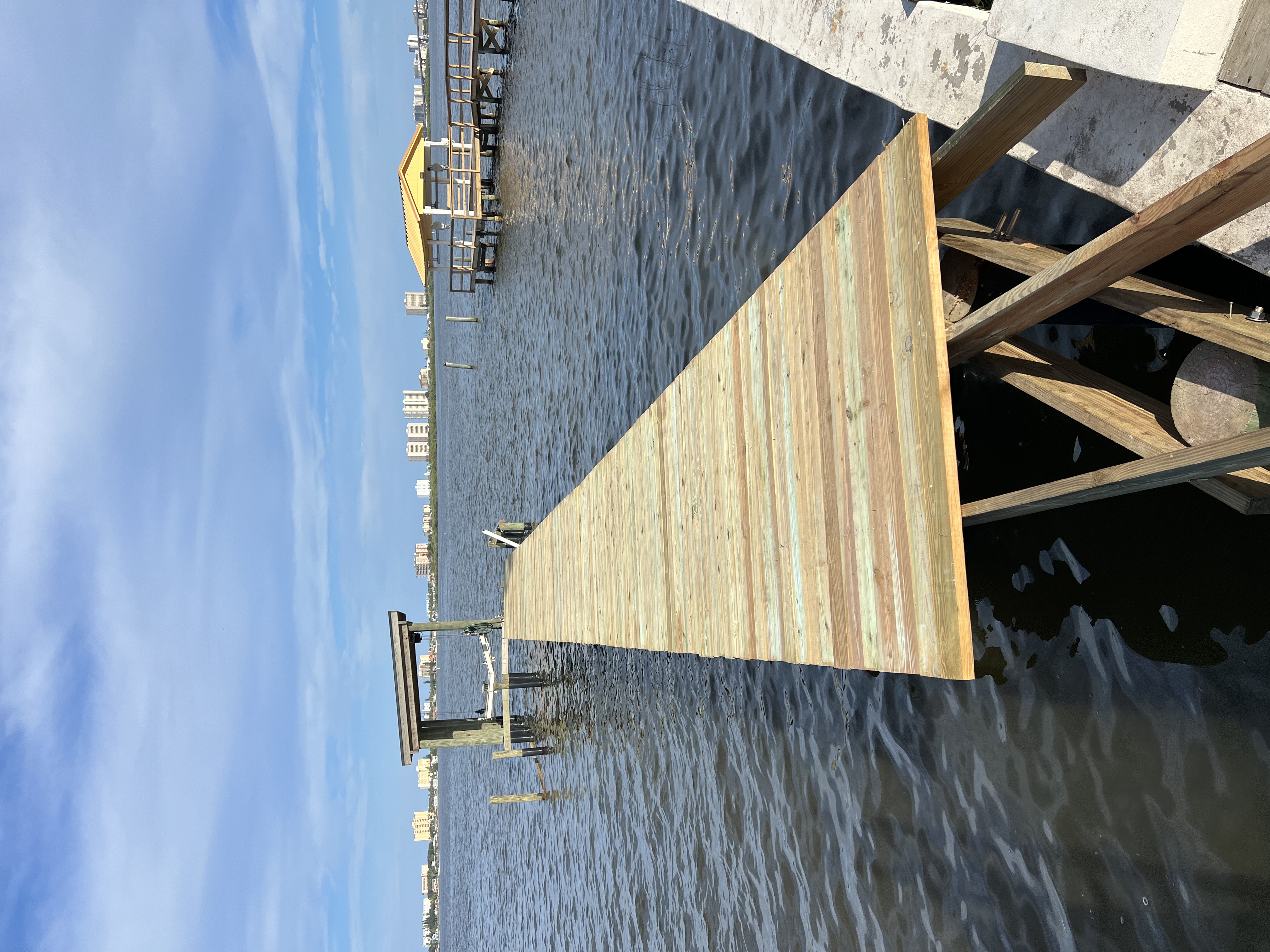 New timber walkway running out to a covered boat lift